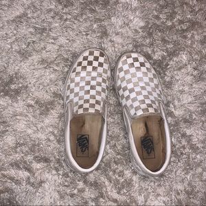 White checkered slip on vans